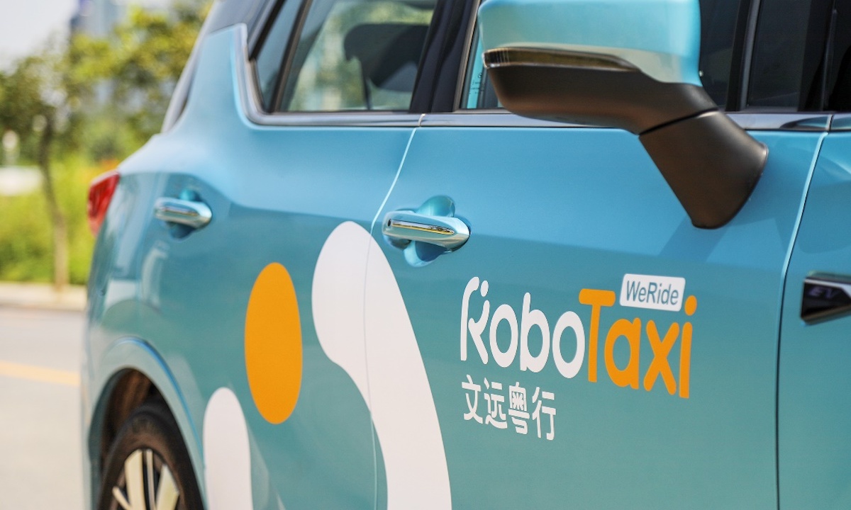 首个十公里城市开放道路试乘，文远知行探索RoboTaxi试运营